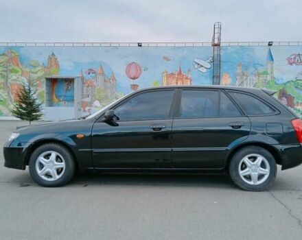 Черный Мазда 323, объемом двигателя 1.6 л и пробегом 305 тыс. км за 3800 $, фото 15 на Automoto.ua