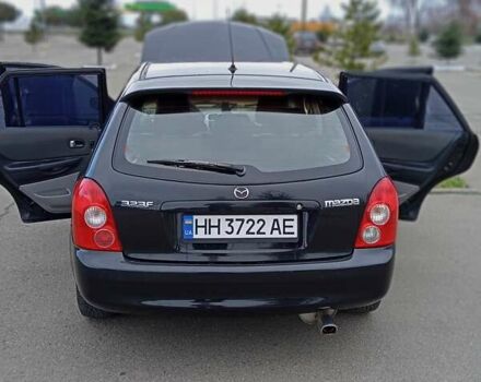 Черный Мазда 323, объемом двигателя 1.6 л и пробегом 305 тыс. км за 3800 $, фото 12 на Automoto.ua