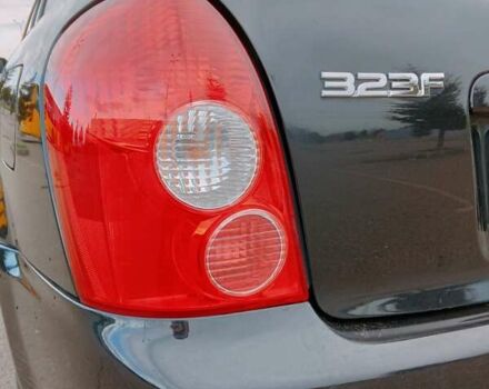 Черный Мазда 323, объемом двигателя 1.6 л и пробегом 305 тыс. км за 3800 $, фото 37 на Automoto.ua