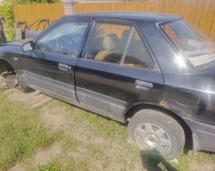 Чорний Мазда 323, об'ємом двигуна 0 л та пробігом 300 тис. км за 350 $, фото 2 на Automoto.ua