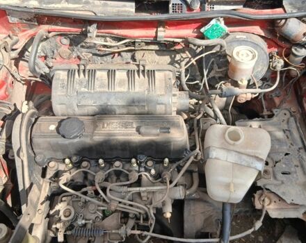 Черный Мазда 323, объемом двигателя 1.7 л и пробегом 750 тыс. км за 400 $, фото 1 на Automoto.ua