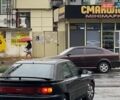 Черный Мазда 323, объемом двигателя 1.6 л и пробегом 50 тыс. км за 1600 $, фото 1 на Automoto.ua