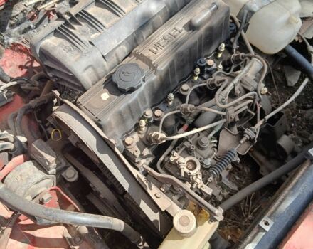 Черный Мазда 323, объемом двигателя 1.7 л и пробегом 750 тыс. км за 400 $, фото 2 на Automoto.ua