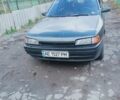 Черный Мазда 323, объемом двигателя 1.7 л и пробегом 260 тыс. км за 1700 $, фото 1 на Automoto.ua