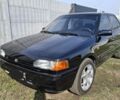 Черный Мазда 323, объемом двигателя 0 л и пробегом 204 тыс. км за 3000 $, фото 7 на Automoto.ua