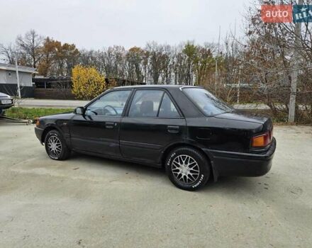 Чорний Мазда 323, об'ємом двигуна 1.5 л та пробігом 450 тис. км за 1200 $, фото 12 на Automoto.ua