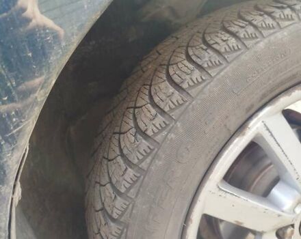 Черный Мазда 323, объемом двигателя 1.49 л и пробегом 319 тыс. км за 2400 $, фото 1 на Automoto.ua