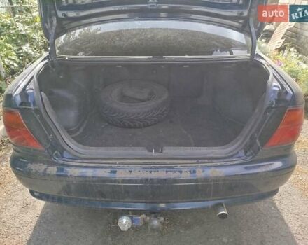 Черный Мазда 323, объемом двигателя 1.49 л и пробегом 319 тыс. км за 2400 $, фото 3 на Automoto.ua