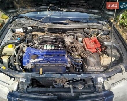 Черный Мазда 323, объемом двигателя 1.49 л и пробегом 319 тыс. км за 2400 $, фото 6 на Automoto.ua