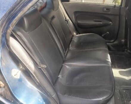 Черный Мазда 323, объемом двигателя 1.49 л и пробегом 319 тыс. км за 2400 $, фото 4 на Automoto.ua