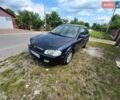 Черный Мазда 323, объемом двигателя 1.5 л и пробегом 282 тыс. км за 2450 $, фото 1 на Automoto.ua