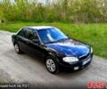 Черный Мазда 323, объемом двигателя 1.6 л и пробегом 217 тыс. км за 2900 $, фото 1 на Automoto.ua