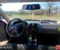 Черный Мазда 323, объемом двигателя 1.8 л и пробегом 384 тыс. км за 2500 $, фото 1 на Automoto.ua