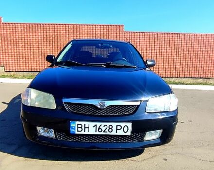 Черный Мазда 323, объемом двигателя 1.8 л и пробегом 384 тыс. км за 2500 $, фото 12 на Automoto.ua