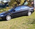 Чорний Мазда 323, об'ємом двигуна 1.6 л та пробігом 196 тис. км за 4500 $, фото 1 на Automoto.ua