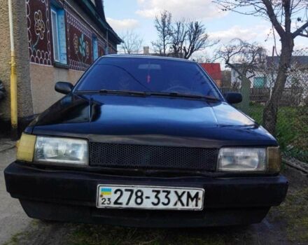 Черный Мазда 323, объемом двигателя 1.5 л и пробегом 249 тыс. км за 750 $, фото 1 на Automoto.ua