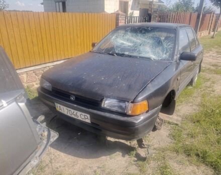 Черный Мазда 323, объемом двигателя 0 л и пробегом 300 тыс. км за 350 $, фото 1 на Automoto.ua