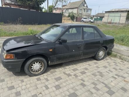 Мазда 323 1989 у Белой Церкве на Automoto.ua Чорний Мазда 323, об'ємом двигуна 1.7 л та пробігом 200 тис. км за 350 $, фото 1 на Automoto.ua