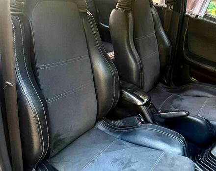 Чорний Мазда 323, об'ємом двигуна 1.8 л та пробігом 450 тис. км за 1430 $, фото 1 на Automoto.ua