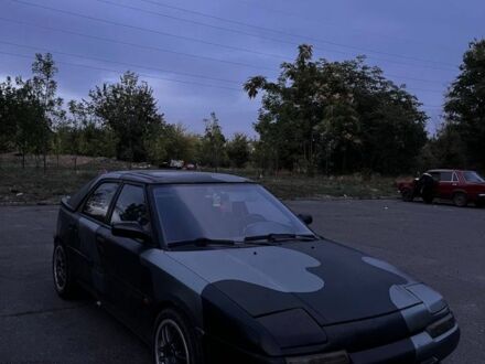 Чорний Мазда 323, об'ємом двигуна 1.8 л та пробігом 777 тис. км за 999 $, фото 1 на Automoto.ua