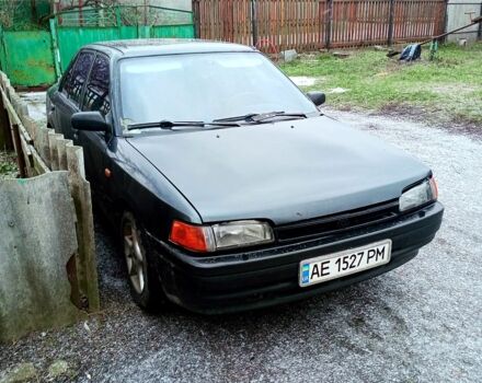 Черный Мазда 323, объемом двигателя 1.7 л и пробегом 0 тыс. км за 1500 $, фото 1 на Automoto.ua