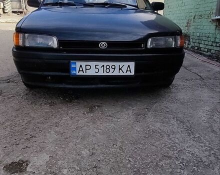 Чорний Мазда 323, об'ємом двигуна 1.72 л та пробігом 315 тис. км за 1600 $, фото 1 на Automoto.ua