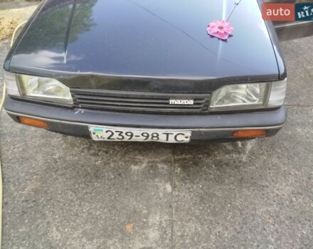 Чорний Мазда 323, об'ємом двигуна 0 л та пробігом 428 тис. км за 1100 $, фото 1 на Automoto.ua