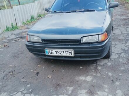 Черный Мазда 323, объемом двигателя 1.7 л и пробегом 260 тыс. км за 1700 $, фото 1 на Automoto.ua