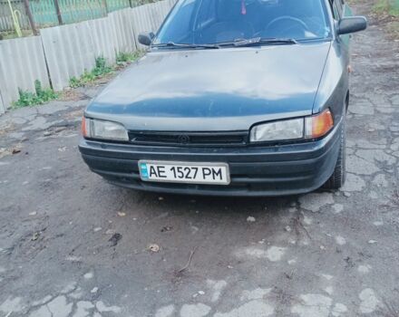 Черный Мазда 323, объемом двигателя 1.7 л и пробегом 260 тыс. км за 1700 $, фото 1 на Automoto.ua