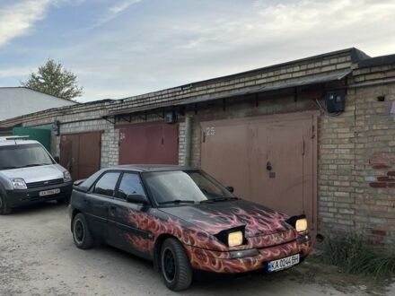 Чорний Мазда 323, об'ємом двигуна 1.6 л та пробігом 338 тис. км за 1300 $, фото 1 на Automoto.ua