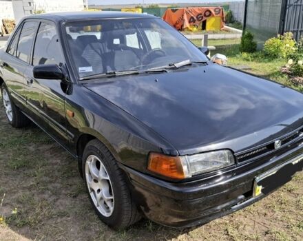 Чорний Мазда 323, об'ємом двигуна 0 л та пробігом 204 тис. км за 3000 $, фото 1 на Automoto.ua