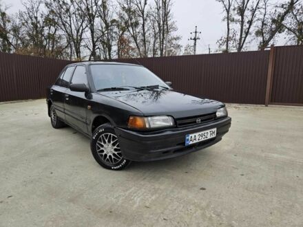 Чорний Мазда 323, об'ємом двигуна 1.5 л та пробігом 400 тис. км за 1200 $, фото 1 на Automoto.ua