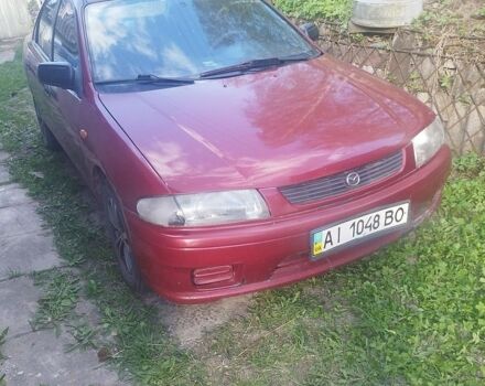 Черный Мазда 323, объемом двигателя 0 л и пробегом 197 тыс. км за 1300 $, фото 1 на Automoto.ua