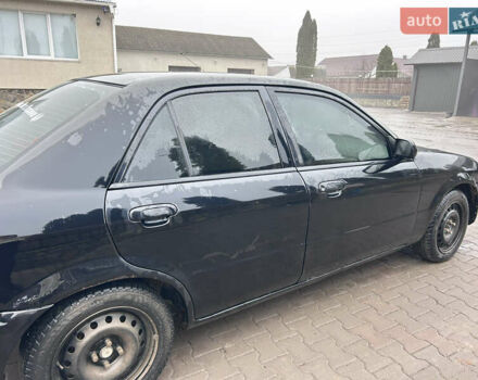 Чорний Мазда 323, об'ємом двигуна 1.6 л та пробігом 347 тис. км за 1700 $, фото 1 на Automoto.ua