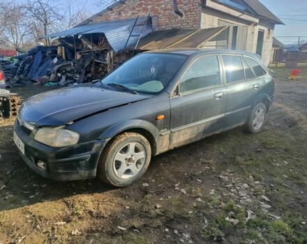 Черный Мазда 323, объемом двигателя 0 л и пробегом 268 тыс. км за 300 $, фото 1 на Automoto.ua