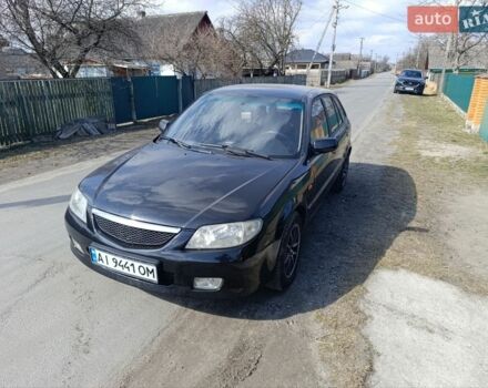 Черный Мазда 323, объемом двигателя 1.6 л и пробегом 283 тыс. км за 2150 $, фото 1 на Automoto.ua