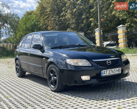 Черный Мазда 323, объемом двигателя 2 л и пробегом 300 тыс. км за 2600 $, фото 1 на Automoto.ua
