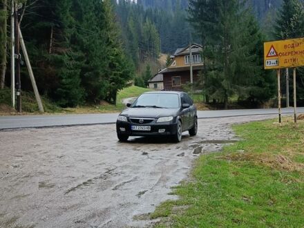 Мазда 323 2001 в Ивано-Франковске на Automoto.ua Черный Мазда 323, объемом двигателя 2 л и пробегом 300 тыс. км за 3100 $, фото 1 на Automoto.ua