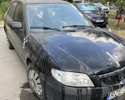 Чорний Мазда 323, об'ємом двигуна 2 л та пробігом 277 тис. км за 1341 $, фото 1 на Automoto.ua