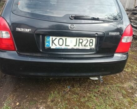 Черный Мазда 323, объемом двигателя 0 л и пробегом 245 тыс. км за 1300 $, фото 1 на Automoto.ua