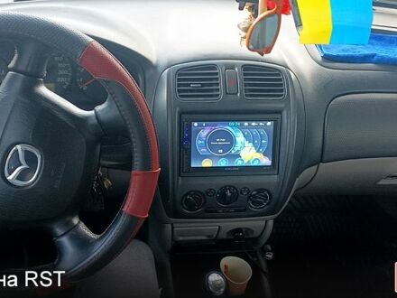 Чорний Мазда 323, об'ємом двигуна 1.6 л та пробігом 0 тис. км за 1200 $, фото 1 на Automoto.ua