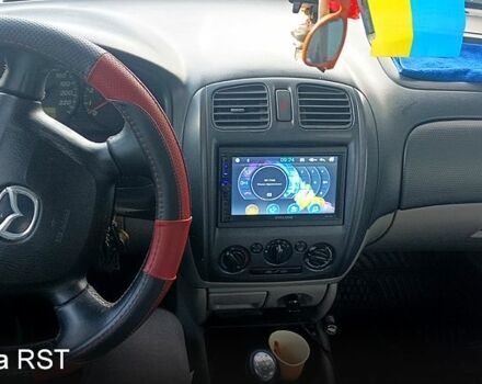 Черный Мазда 323, объемом двигателя 1.6 л и пробегом 0 тыс. км за 1200 $, фото 1 на Automoto.ua