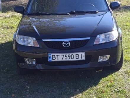 Чорний Мазда 323, об'ємом двигуна 1.6 л та пробігом 196 тис. км за 4500 $, фото 1 на Automoto.ua