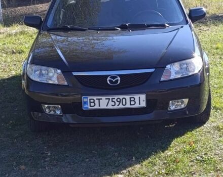 Чорний Мазда 323, об'ємом двигуна 1.6 л та пробігом 196 тис. км за 4500 $, фото 1 на Automoto.ua