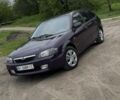 Фіолетовий Мазда 323, об'ємом двигуна 1.5 л та пробігом 200 тис. км за 2500 $, фото 1 на Automoto.ua