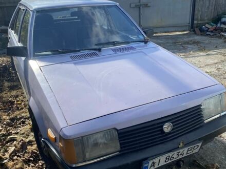 Фиолетовый Мазда 323, объемом двигателя 1.3 л и пробегом 120 тыс. км за 949 $, фото 1 на Automoto.ua