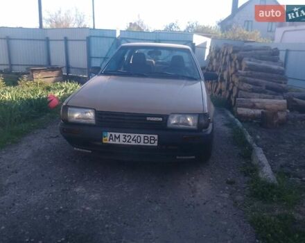 Коричневый Мазда 323, объемом двигателя 0 л и пробегом 230 тыс. км за 1300 $, фото 1 на Automoto.ua