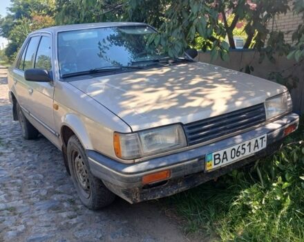 Коричневый Мазда 323, объемом двигателя 0 л и пробегом 297 тыс. км за 500 $, фото 1 на Automoto.ua