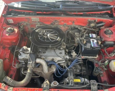 Красный Мазда 323, объемом двигателя 1.3 л и пробегом 225 тыс. км за 650 $, фото 5 на Automoto.ua