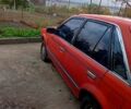 Красный Мазда 323, объемом двигателя 1.7 л и пробегом 370 тыс. км за 450 $, фото 1 на Automoto.ua
